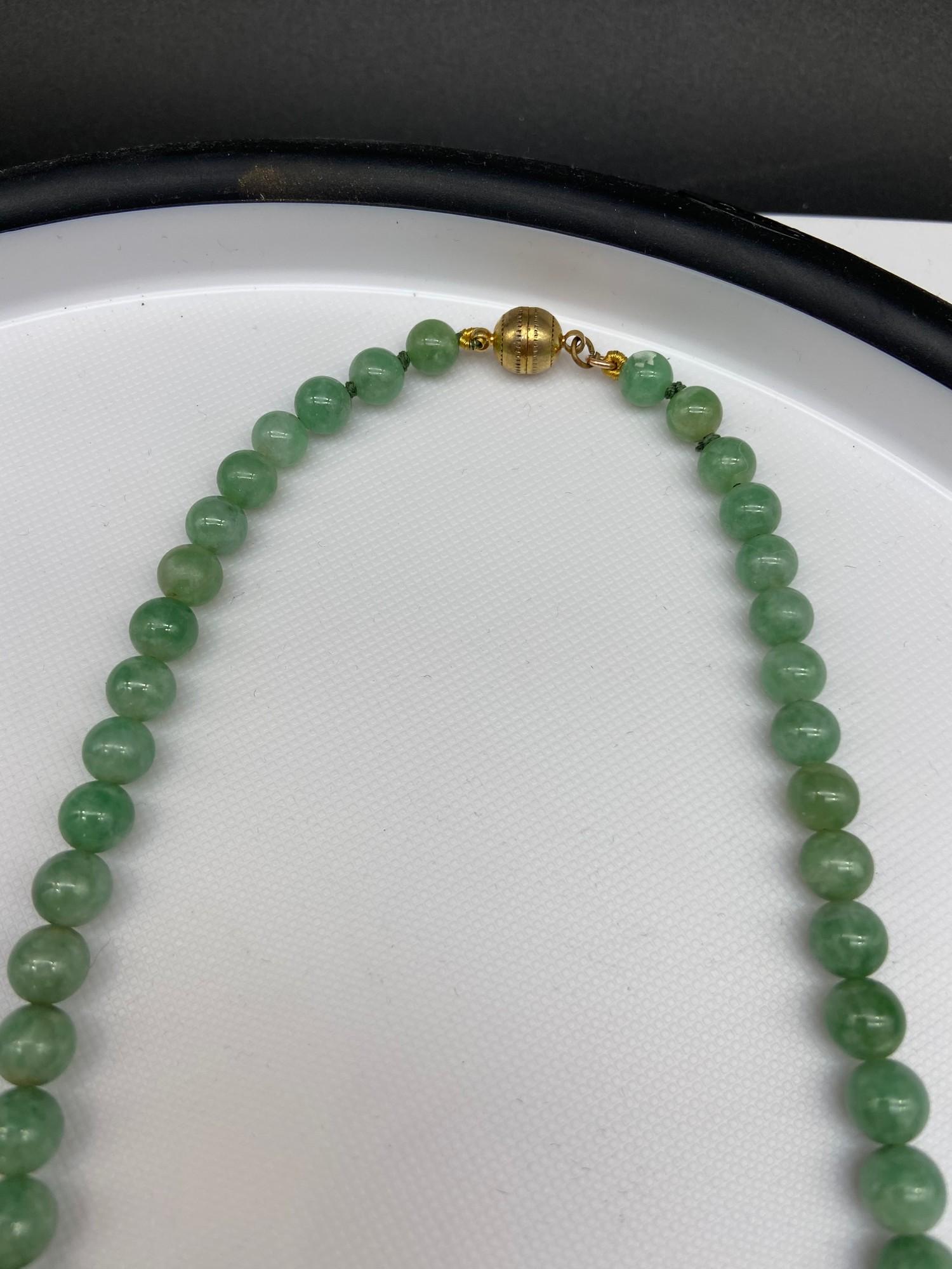A Vintage jade graduating bead necklace together with a pair of green jade earrings. - Image 3 of 3