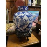 An 18th/ 19th century Chinese Kangxi marked large preserve jar with lid. Together with a hand carved