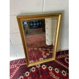 A Vintage gilt framed, Bevel edge mirror. [85X55CM]