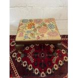 A 19th century ball and claw carved leg, dressing table stool. Finished with a floral tapestry