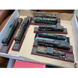 A Selection of various train models fixed on stands