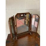 An 19th century mahogany framed three way mirror. Designed with two acorn finials [H:64CM, L:74CM]