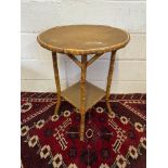 A 19th century bamboo and weaved two tier side table. [Standing 70cm high and 52cm wide]