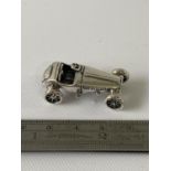 A Silver Morgan style car sculpture/ Figure. [3.5cm in length]