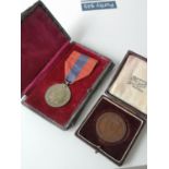 A Faithful service medal to Angus Cameron. Comes with its box. Together with a Bronze Coronation