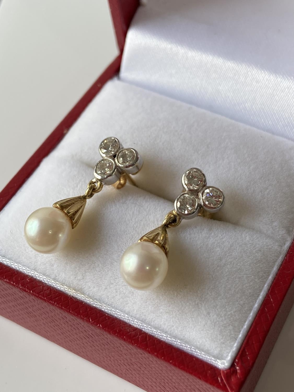 A pair of 18ct gold diamond & pearl drop earrings [2 3/4mm x 6 diamonds] [2.90g]