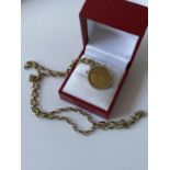 A 9ct gold 1/2 sovereign, dated 1905, with a 9ct gold casing and a 9ct gold belcher chain [length