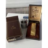 A vintage boxed Colibri of London duo-flame gold plated lighter together with a Ronson West German