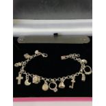 A Silver charm bracelet. [13charms] [19cm in length]
