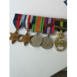 A Set of four WW2 Medals & 1952 ERII Territorial medal.