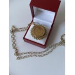 A gold full sovereign, dated 1906, with a 9ct gold pendant & finished with a 9ct gold belcher