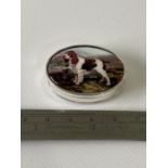 A Silver pill box with enamel lid of a spaniel. [1.4x3.6x2.8cm]