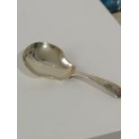 A LONDON SILVER TEA CADDY SPOON, DATED 1911 [8.5CM IN LENGTH]