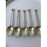 A set of 5 London silver golf tea spoons, designed with golf finials [Robert Pringle & Sons] [52.