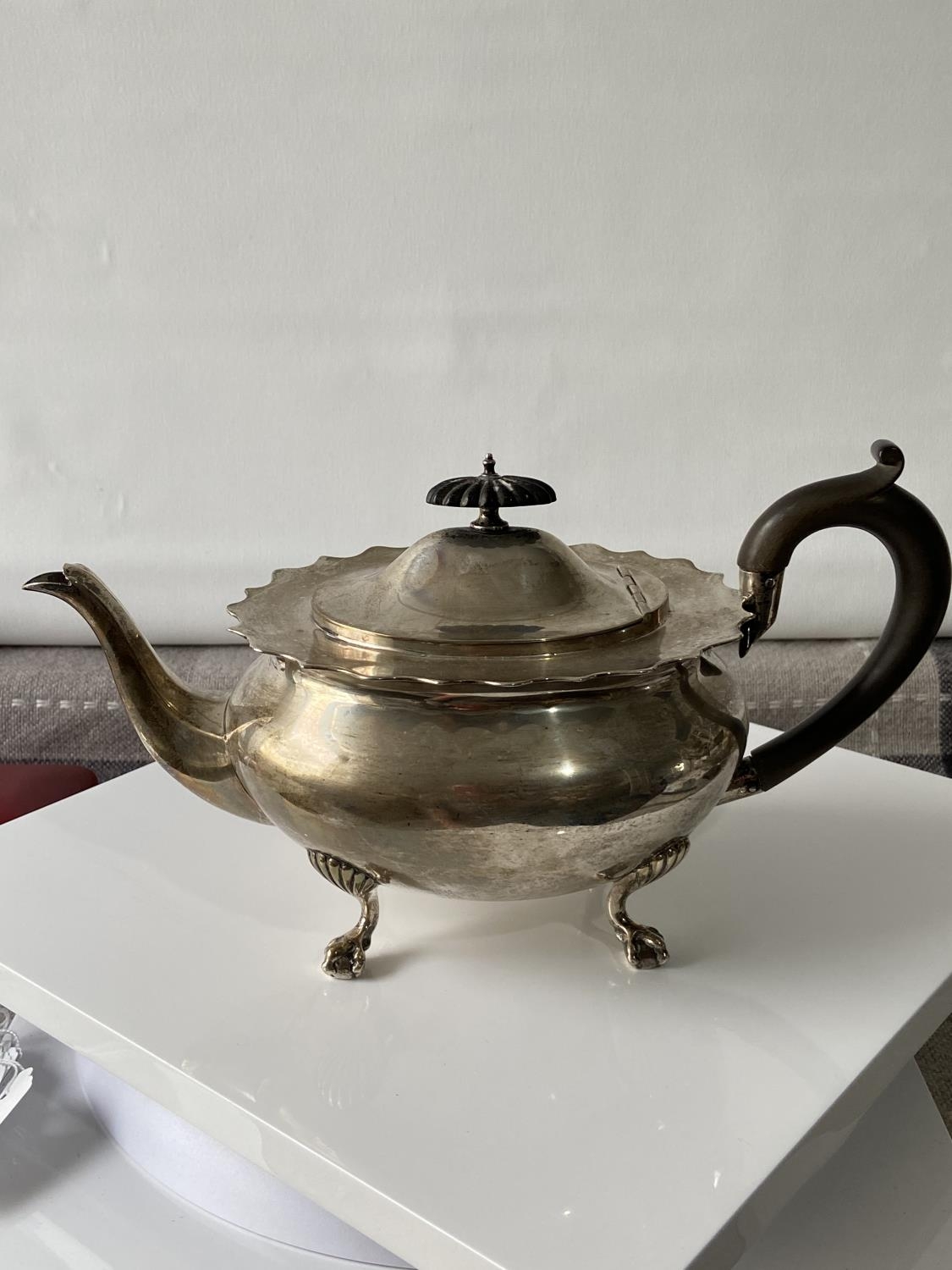 A Birmingham silver teapot supported on claw & ball feet, engraved to the side showing a dragon - Image 9 of 14