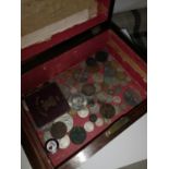 A MAHOGANY BOX CONTAINING A COLLECTION OF SILVER AND OLD COINS. INCLUDES 1964 HALF DOLLAR, CROWNS