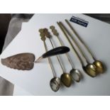 A Lot of 6 Japanese Condiment spoons and a white metal Indian & horn handle cake slice.