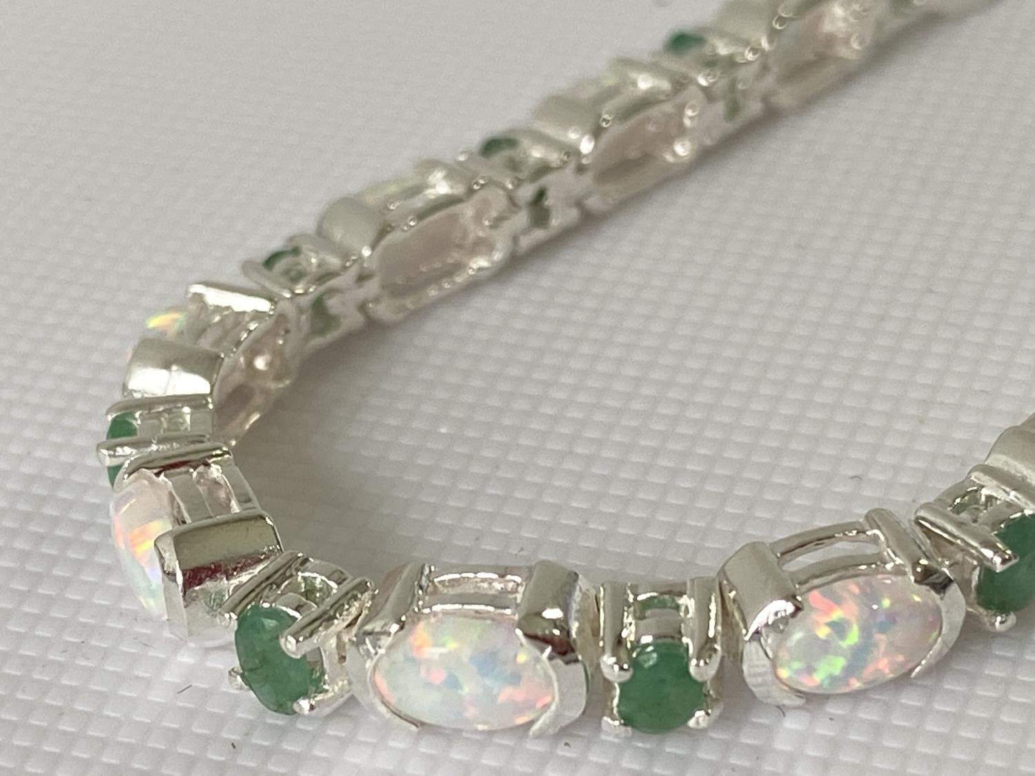 A Silver opal and emerald line bracelet [18.5cm in length] - Image 4 of 8