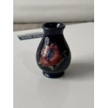 A rare miniature Moorcroft vase [as found] [height, 5.5cm]