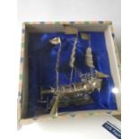 A Nice example of a Chinese silver plated junk boat with a presentation box. [23x17x8cm]
