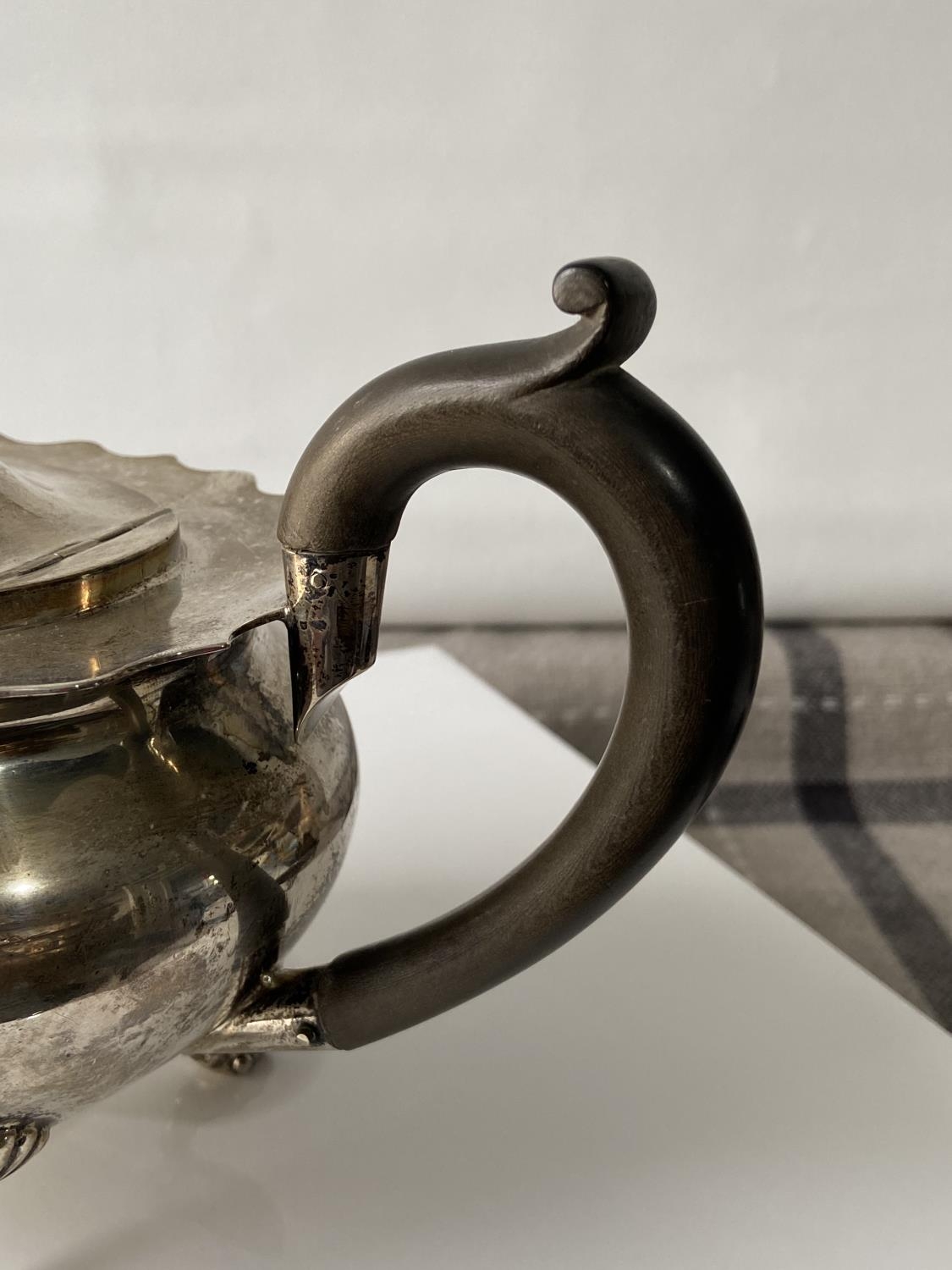 A Birmingham silver teapot supported on claw & ball feet, engraved to the side showing a dragon - Image 11 of 14