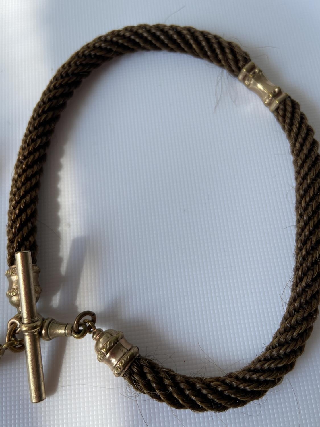 A 19th century albert chain made from braided hair, gilt metal attachments and amethyst & gilt metal - Bild 5 aus 6