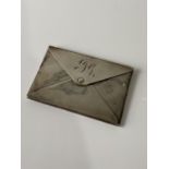 A Birmingham silver card case in the form of an envelope produced by Adie & Lovekin ltd. Dated 1904.