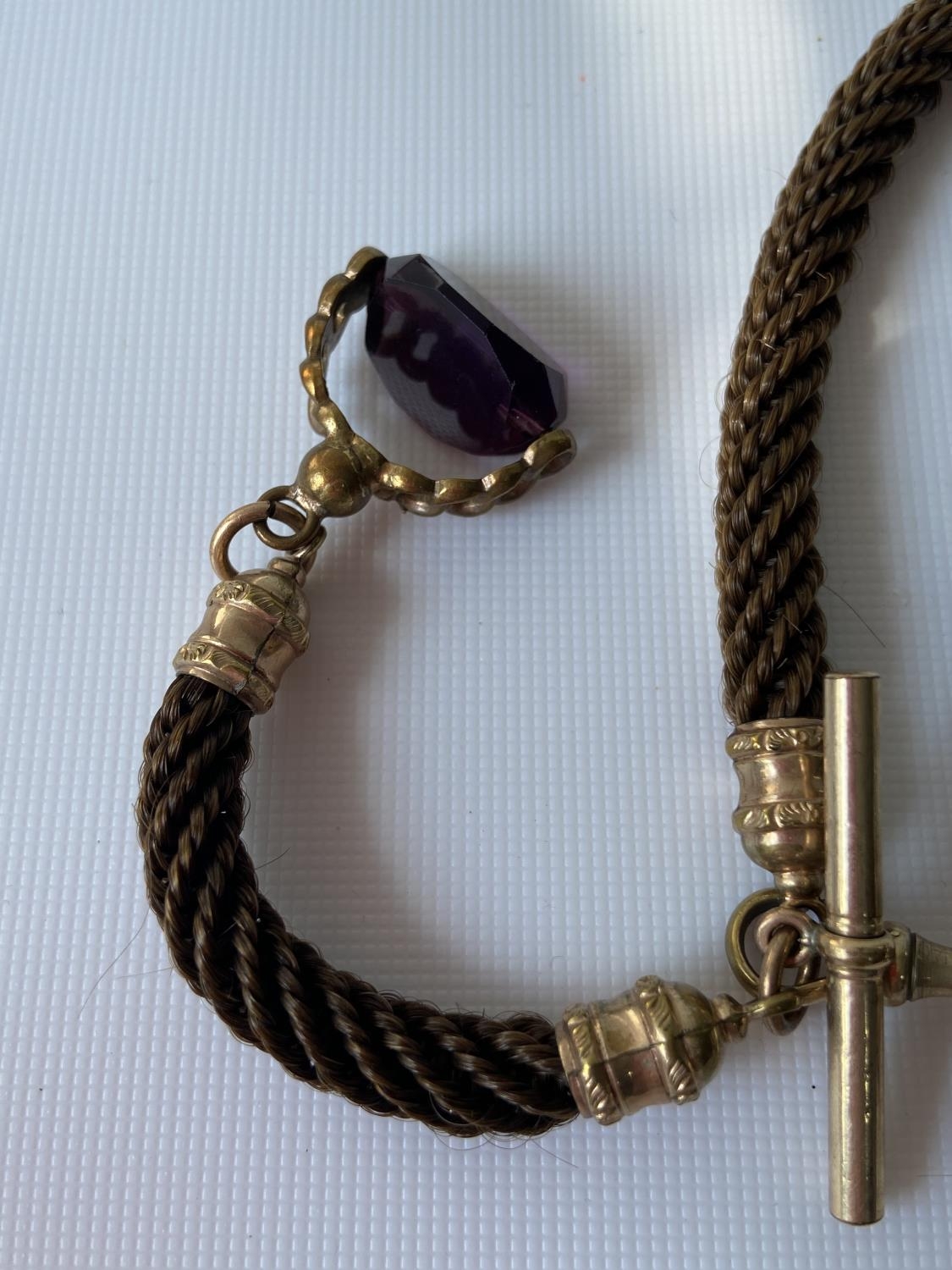A 19th century albert chain made from braided hair, gilt metal attachments and amethyst & gilt metal - Bild 4 aus 6
