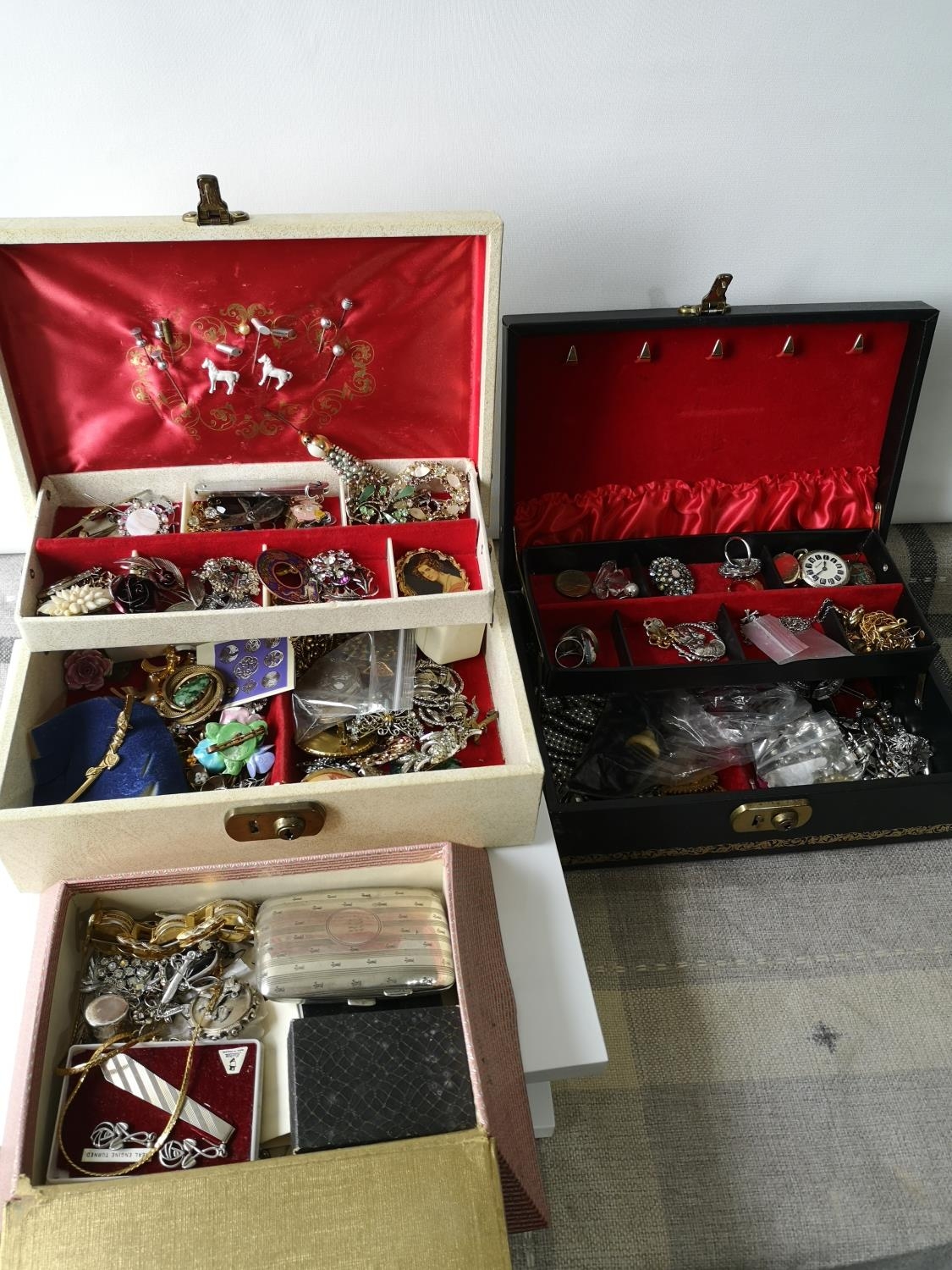 Three jewellery boxes containing various vintage costume jewellery. plated cigarette case,