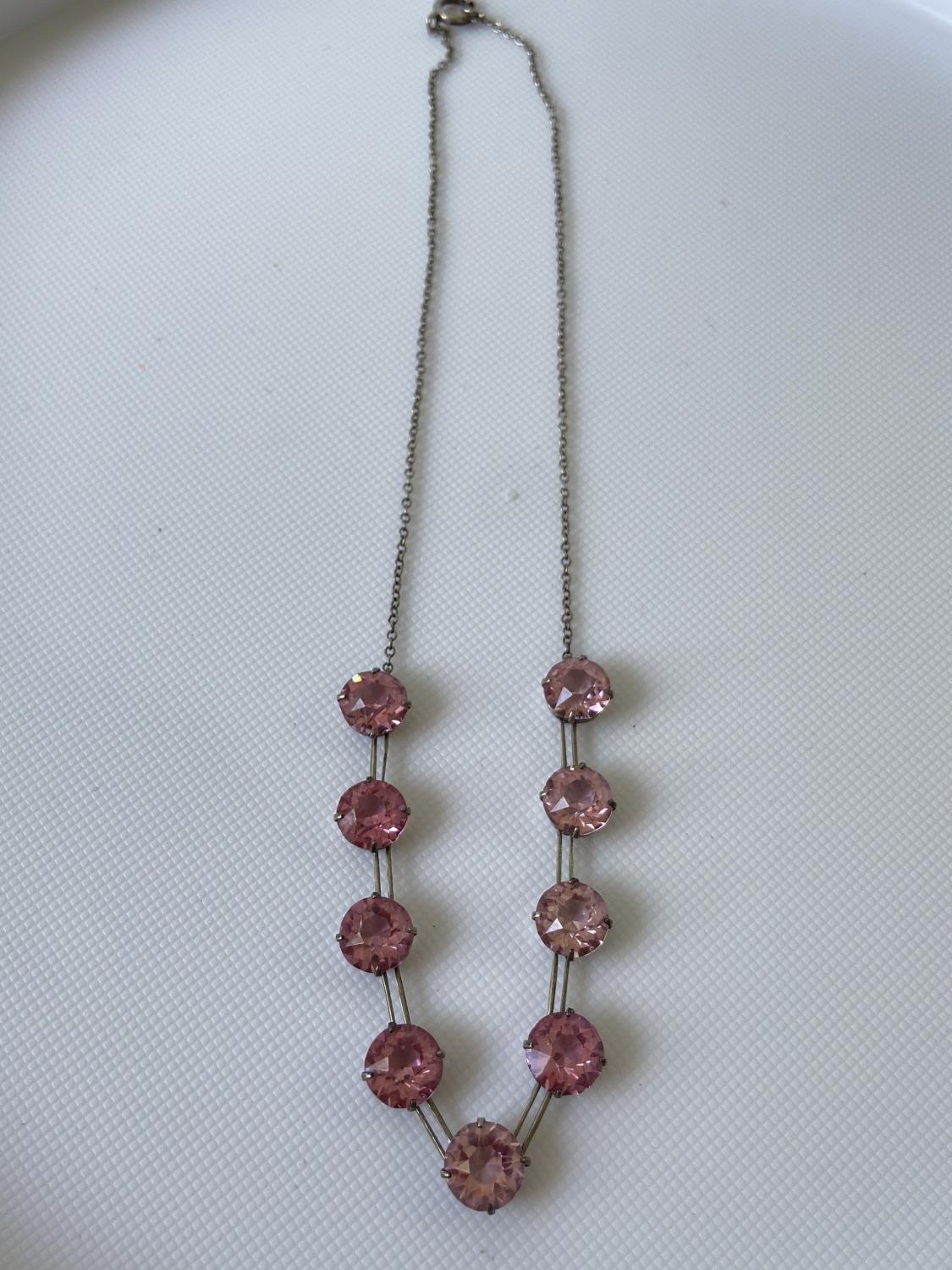 A vintage white metal art deco necklace fitted with 9 large pink cut stones [length 35cm] - Image 2 of 4