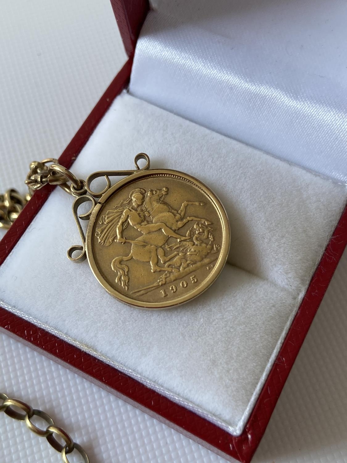 A 9ct gold 1/2 sovereign, dated 1905, with a 9ct gold casing and a 9ct gold belcher chain [length - Image 5 of 6