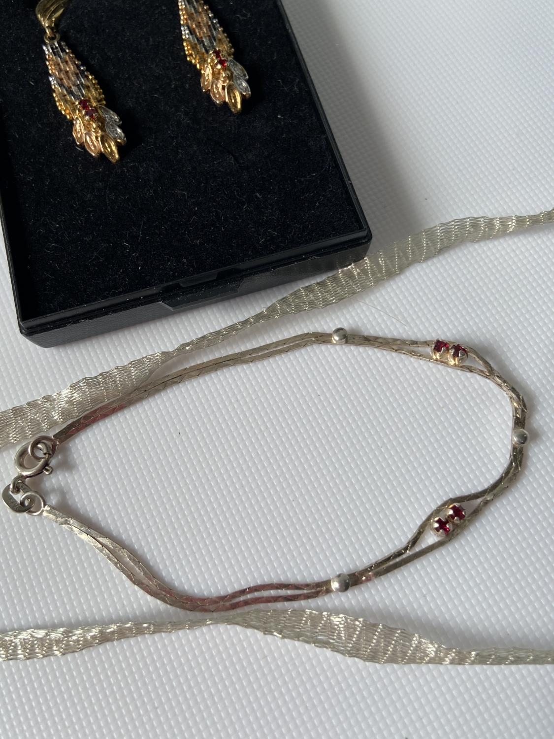 A pair of ornate 925 silver two tone clip-on earring set with garnets, silver bracelet with - Image 6 of 8