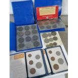 TWO BRITAINS FIRST DECIMAL COIN SETS AND VARIOUS COIN WALLETS CONTAINING ONE PENNY'S AND HALF