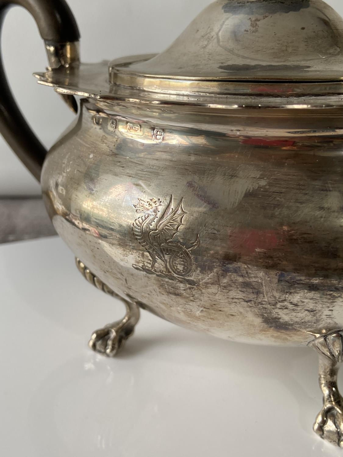 A Birmingham silver teapot supported on claw & ball feet, engraved to the side showing a dragon - Image 3 of 14