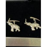 A Pair of silver elephant cufflinks.