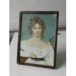 A 19th century miniature lady portrait fitted within a silver plated frame. [9.7x7cm]