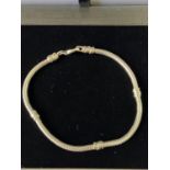 A Silver bracelet of a rope form. [20cm in length]