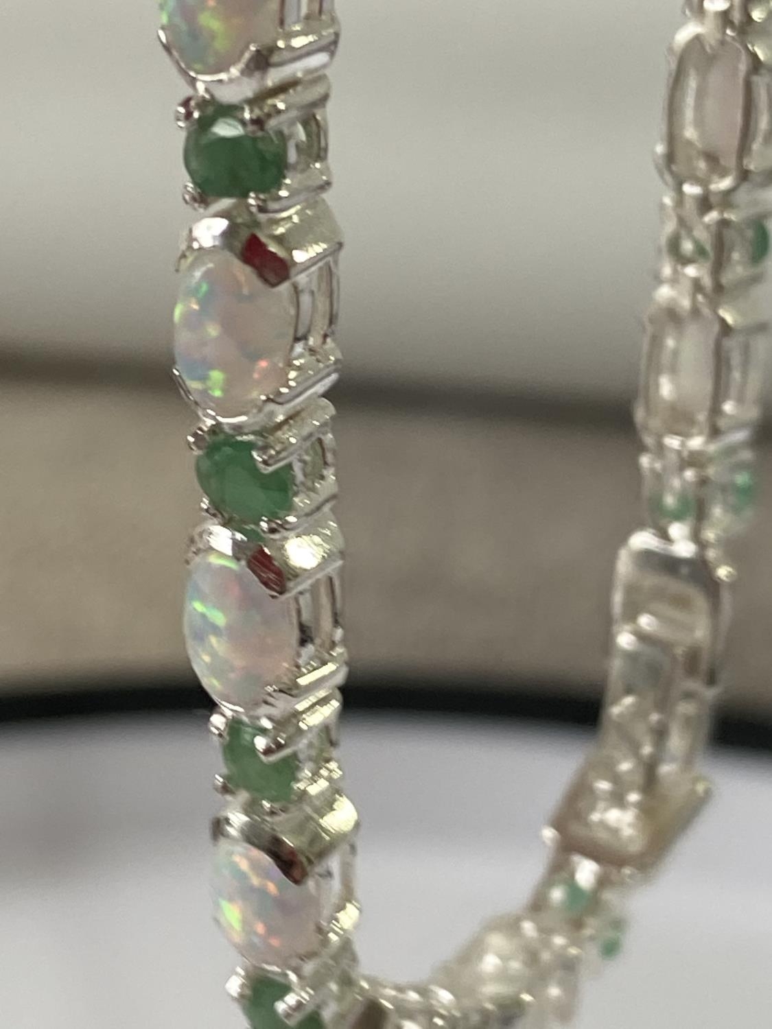 A Silver opal and emerald line bracelet [18.5cm in length] - Image 6 of 8