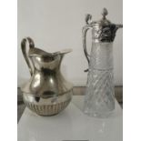 A NICE EXAMPLE OF A SILVER PLATE AND CUT GLASS CLARET JUG TOGETHER WITH AN ALPACA PLATED WATER