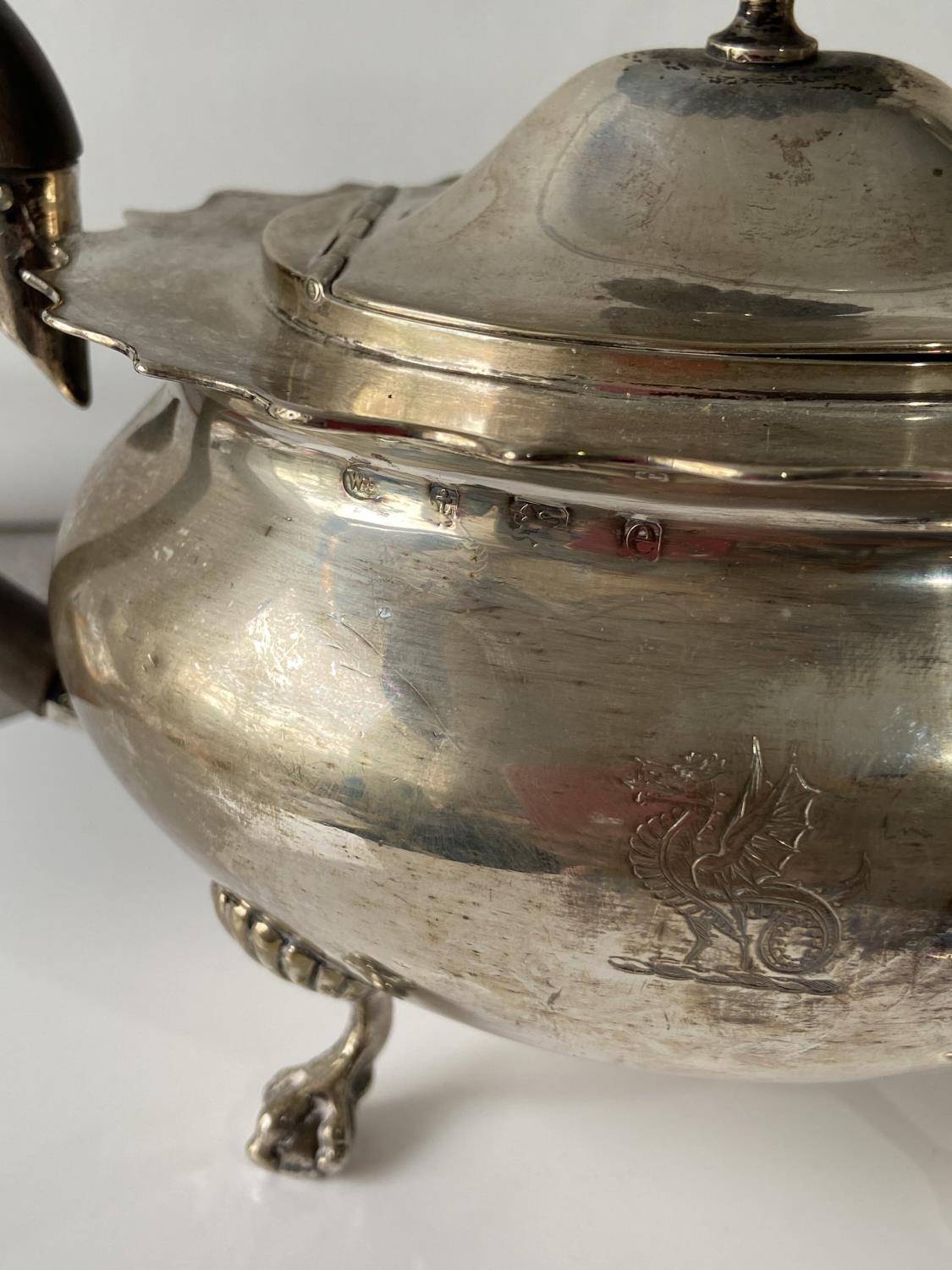 A Birmingham silver teapot supported on claw & ball feet, engraved to the side showing a dragon - Image 6 of 14