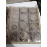 AN ALBUM CONTAINING A QUANTITY 0F 19TH AND 20TH CENTURY COINS TO INCLUDE TWO SPANISH ISABELL II
