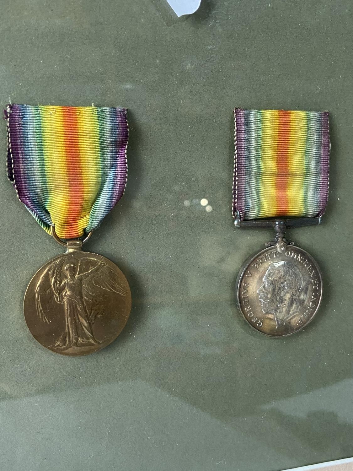 A Framed WWI War & Victory medals with photograph of officer. Medals belong to 74571 PTE. J. E. P. - Image 5 of 6