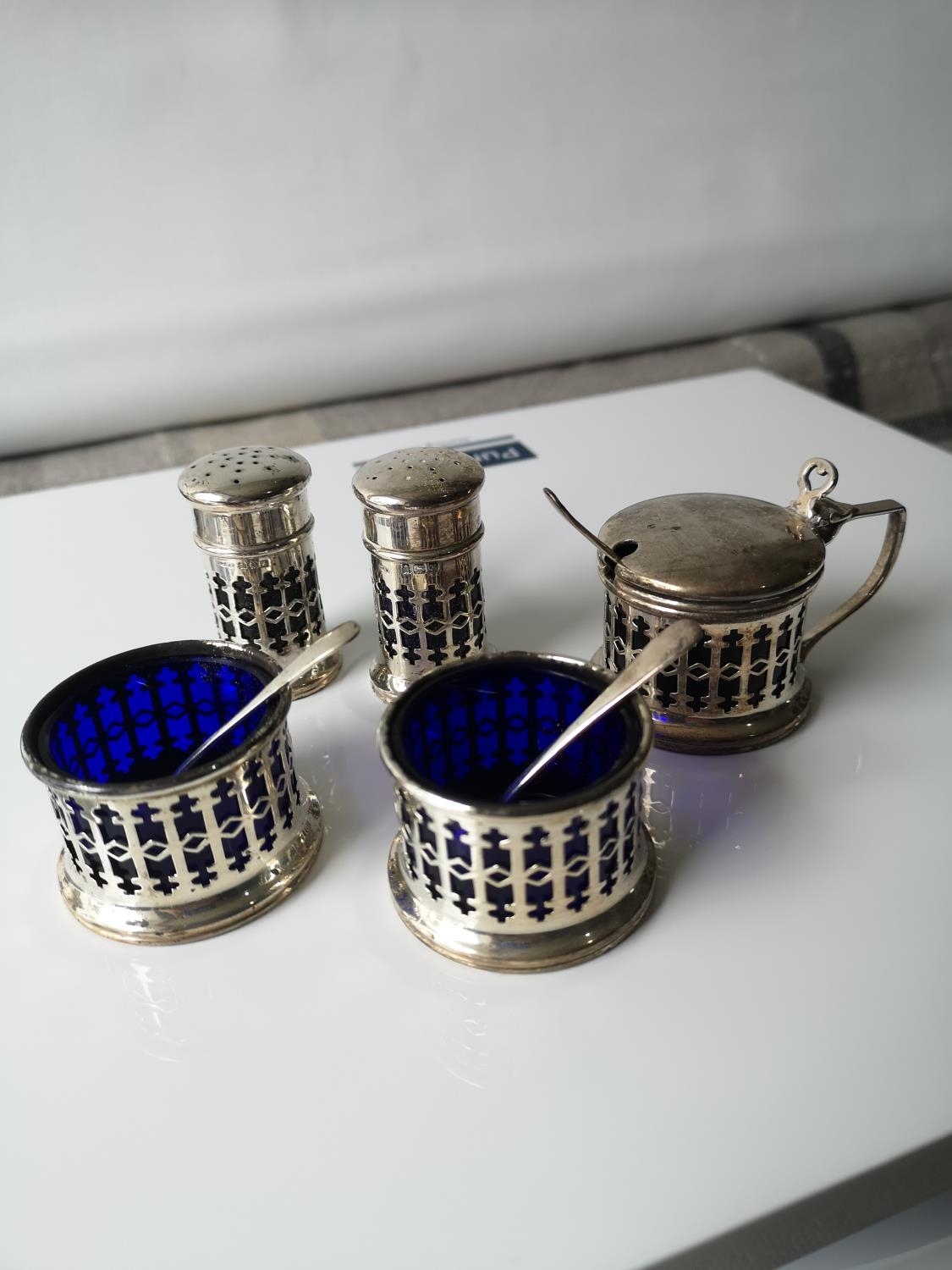 A Lot of five Birmingham silver condiment & cruet pots produced by Docker & Burn ltd with three