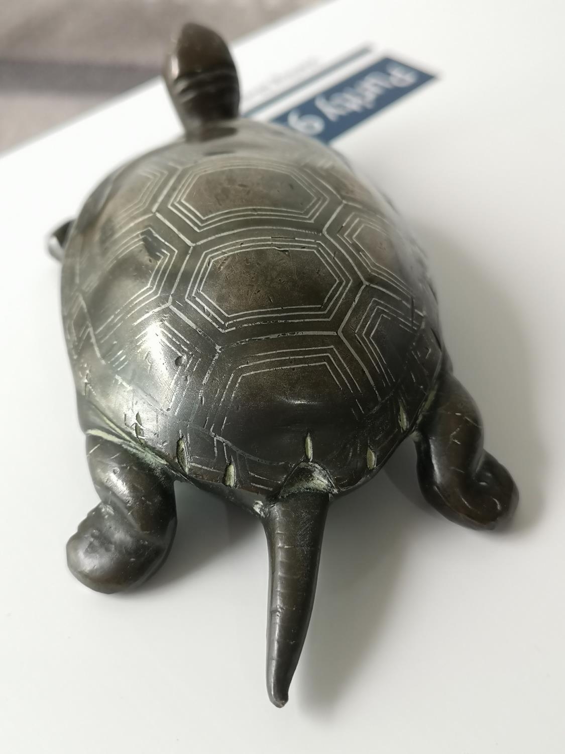 An antique heavy bronze turtle sculpture with silver shell inlay. [3.5x12.5x7cm] - Image 3 of 5