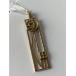A 9ct gold Rennie McIntosh rose design pendant [length 5.6cm] [4.52g]