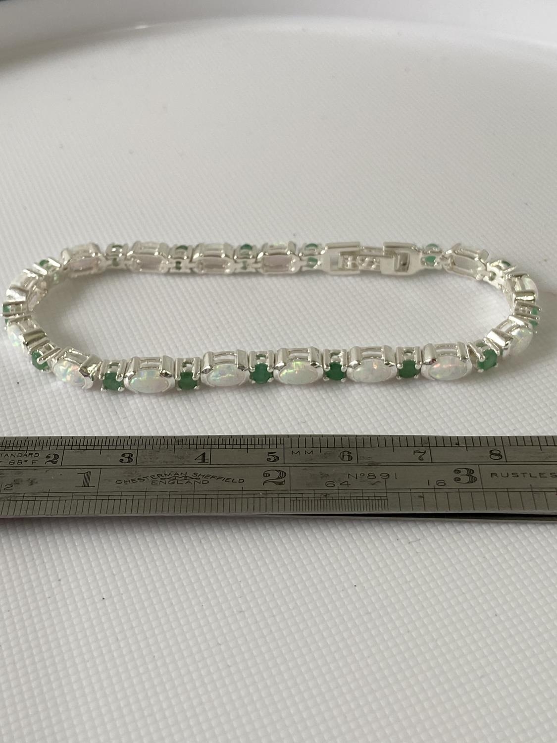 A Silver opal and emerald line bracelet [18.5cm in length] - Image 2 of 8
