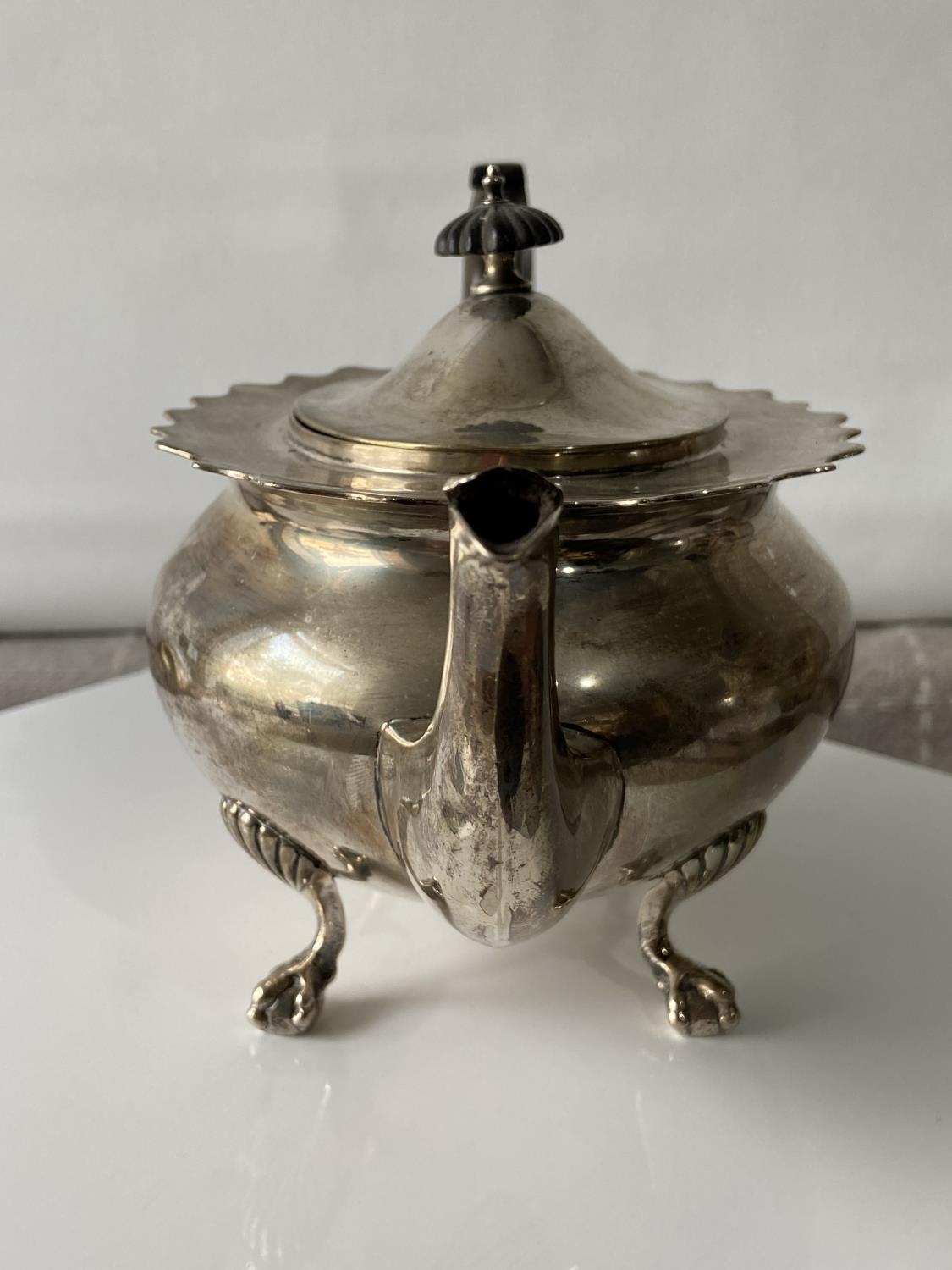 A Birmingham silver teapot supported on claw & ball feet, engraved to the side showing a dragon - Image 7 of 14