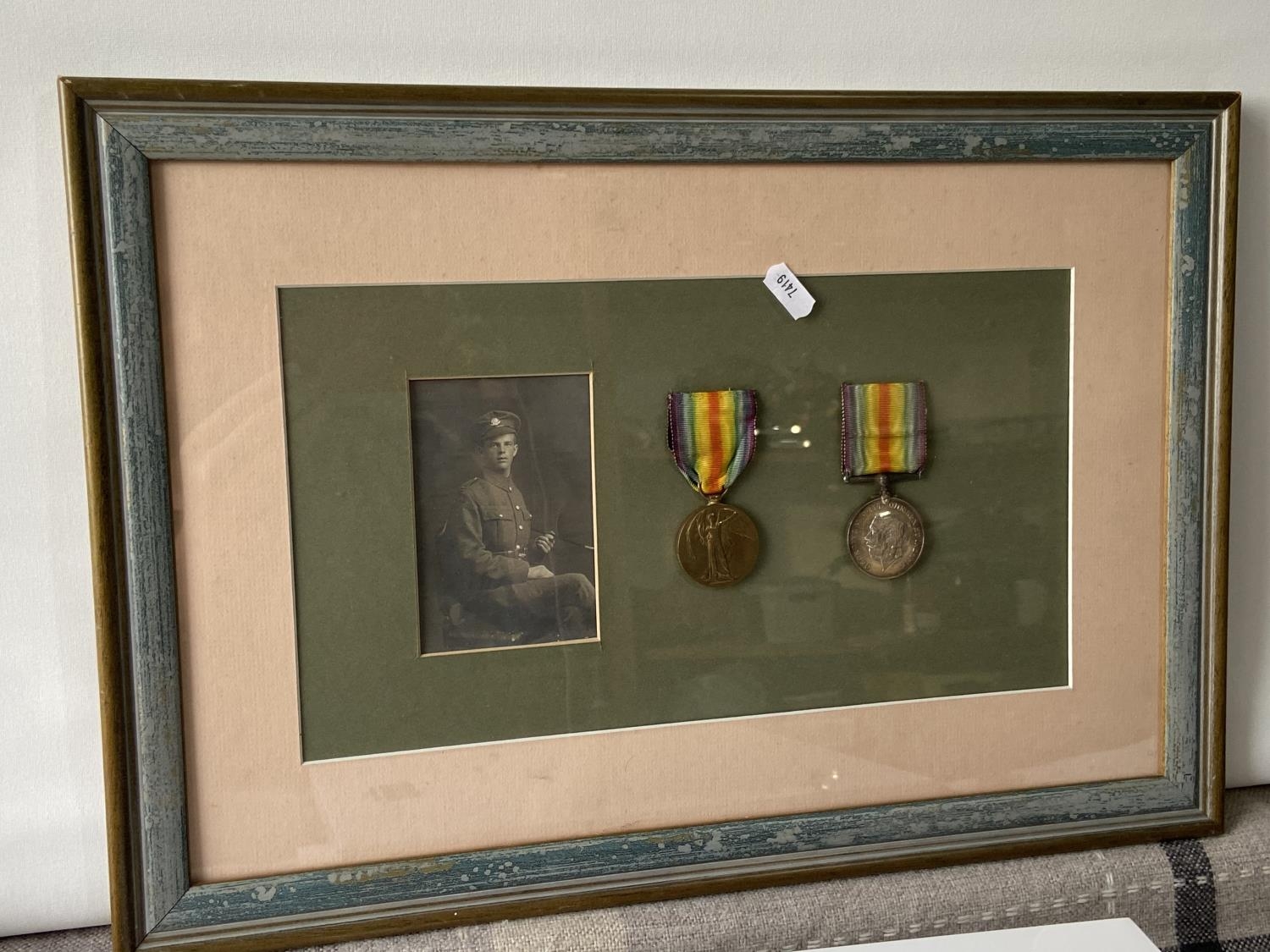 A Framed WWI War & Victory medals with photograph of officer. Medals belong to 74571 PTE. J. E. P. - Image 2 of 6