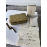 A WW1 Christmas tin containing a letter from Princess Mary, a pencil in the shape of a bullet fitted