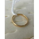 A 22ct gold wedding band [Ring size N] [2.33Grams]